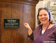 United Methodist History class member Logan Alley with John Wesley's traveling pulpit at the World Methodist Museum at Lake Junaluska. Photo courtesy of Laurel Akin