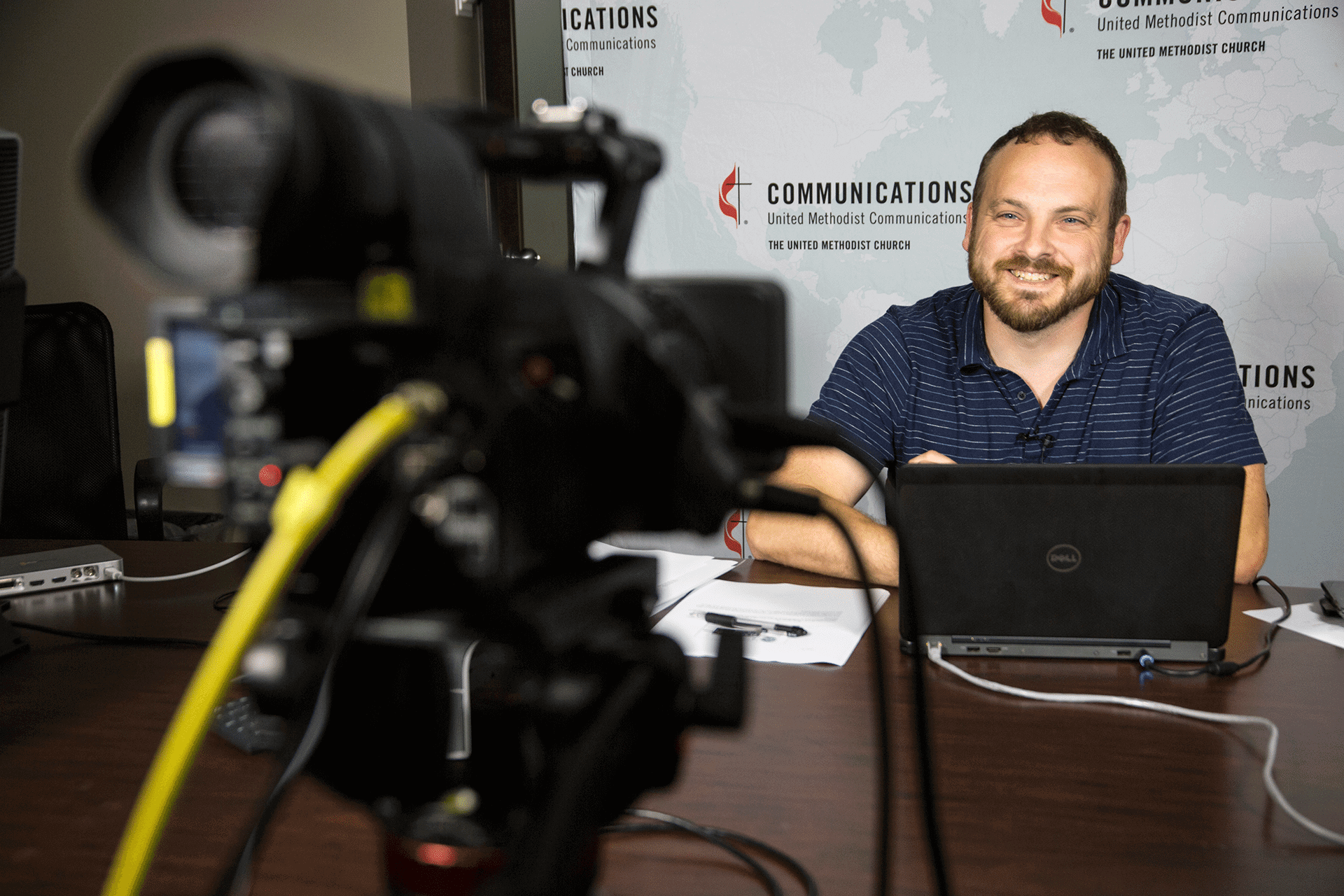 Craig Catlett prepares for a webinar titled, "7 Ways to Promote Your Church Event on Facebook." Catlett is a training and development specialist at United Methodist Communications. Photo by Kathleen Barry, United Methodist Communicaitons.